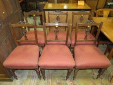 A SET OF SIX EDWARDIAN CARVED DINING CHAIRS