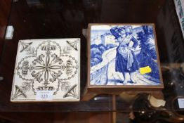 A MINTON AND HOLLANDS MONOCHROME TILE TOGETHER WITH A BLUE AND WHITE MINTONS TILE IN COPPER MOUNTING