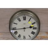 A VINTAGE CIRCULAR BRASS MOUNTED WALL CLOCK