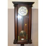 AN ANTIQUE VIENNA WALLCLOCK WITH TWIN WEIGHTS H-93 CM