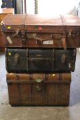 A TIN TRAVEL TRUNK & TWO VINTAGE SUITCASES (3)