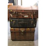 A TIN TRAVEL TRUNK & TWO VINTAGE SUITCASES (3)