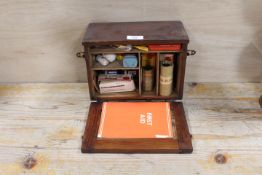 A WOODEN CASED PARAGON FIRST AID BOX AND CONTENTS