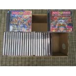 A BOX CONTAINING APPROXIMATELY 24 JUDGE DREDD CD'S, TO INCLUDE THE TWO CD ORIGINAL ADVENTURES