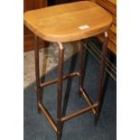 A MODERN STOOL WITH COPPER LEGS