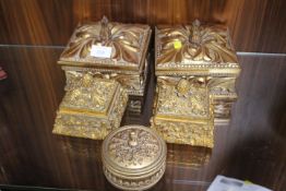 FIVE DECORATIVE GILDED LIDDED BOXES