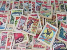 A BOX CONTAINING WARLORD AND BULLET COMICS FROM 1975 TO 1979