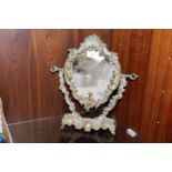 A DECORATIVE GILT METAL DRESSING TABLE MIRROR