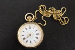 A CONTINENTAL YELLOW METAL OPEN FACE MANUAL WIND FOB WATCH ON A HALLMARKED 9 CARAT GOLD CHAIN