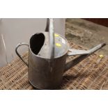 A VINTAGE GALVANIZED WATERING CAN