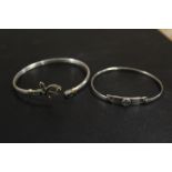 TWO CELTIC STYLE SILVER BANGLES