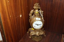 A IMPERIAL GILT METAL MANTLE CLOCK