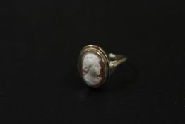 AN UNMARKED METAL CAMEO RING APPROX 2.2G