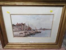 A GILT FRAMED AND GLAZED PRINT OF A STUART LLOYD WATER COLOUR OF A RIVER BANK TAVERN