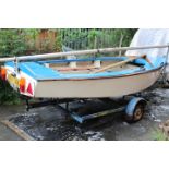 A LARGE 15FT FIBREGLASS SAILING BOAT ON TRAILER