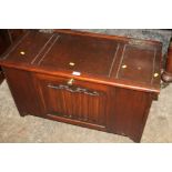 AN OAK PANELLED BLANKET BOX