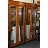 A PAIR OF LARGE MODERN GLAZED CHINESE STYLE BOOKCASES - GLASS SHELVES H-203 W-81 CM (2)