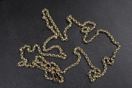 A VICTORIAN ROLLED GOLD MUFF OR LONG CHAIN