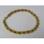 A HALLMARKED 9CT GOLD ROPE TWIST BRACELET, approximate weight 8 g