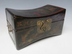 A 20TH CENTURY ORIENTAL LACQUERED PILLOW BOX, decorated with typical figurative detail, W 25.5 cm