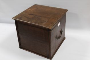 AN ANTIQUE OAK TRAVELLING BOX, with vintage potion and apothecary bottles to the interior, twin