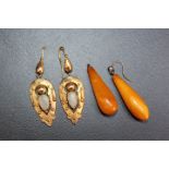 A PAIR OF ANTIQUE OPAL DROPPER EARRINGS, set in unmarked yellow metal, one opal has small chip to