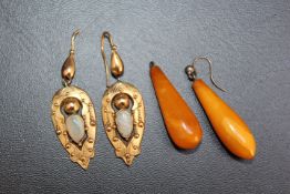 A PAIR OF ANTIQUE OPAL DROPPER EARRINGS, set in unmarked yellow metal, one opal has small chip to