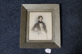 W. MOORE. A portrait study of a Georgian gentleman holding a crop, signed and dated 1836 middle to