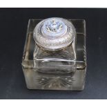 A HALLMARKED SILVER LIDDED GLASS INKWELL BY THE DOUGLAS CLOCK COMPANY - BIRMINGHAM 1902, the lid