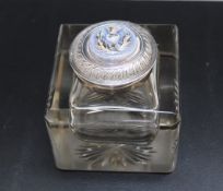 A HALLMARKED SILVER LIDDED GLASS INKWELL BY THE DOUGLAS CLOCK COMPANY - BIRMINGHAM 1902, the lid