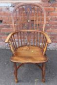 A 19TH CENTURY OAK WINDSOR CHAIR, with crinoline stretcher, overall H 102 cmCondition Report:Three