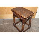 A LATE 17TH CENTURY OAK JOINT STOOL, raised on turned supports untied by a stretchers, H 58 cm, W 46