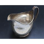 A GEORGIAN HALLMARKED SILVER CREAM JUG - LONDON 1806, makers mark indistinct. approx weight 91g, H