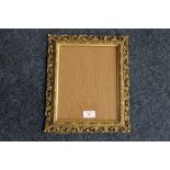 A 19TH CENTURY PIERCED GOLD FRAME, with strut back, glazed, frame W 4 cm, rebate 24 x 19 cm