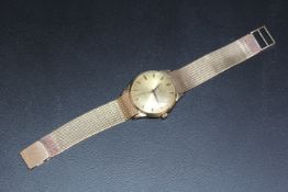 A HALLMARKED 14 CARAT GOLD RADO JUBILAR WRIST WATCH, with date window at 3 o'clock, approx weight