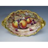 A ROYAL WORCESTER OVAL HAND PAINTED FRUIT STUDY, signed D. Winter, W 30 cm