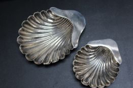 TWO HALLMARKED SILVER SHELL BUTTER DISHES, both by Stokes & Ireland Ltd, both having Chester assay