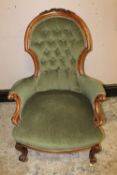 A VICTORIAN MAHOGANY SPOONBACK GENTLEMANS ARMCHAIR, with carved detail