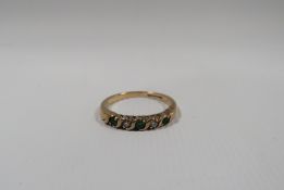 A HALLMARKED 9CT GOLD DIAMOND AND EMERALD ETERNITY RING, approx 1.85 g, ring size K