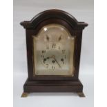 A THREE TRAIN WESTMINSTER CHIME MANTLE CLOCK, with mahogany break arch case, H 40 cm