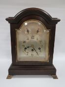 A THREE TRAIN WESTMINSTER CHIME MANTLE CLOCK, with mahogany break arch case, H 40 cm