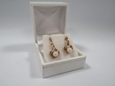 A PAIR OF 9CT GOLD AND PEARL EARRINGS, hallmarked to posts, only one butterfly marked 9ct, approx