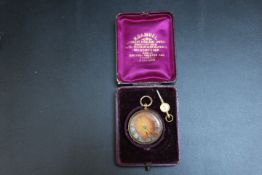 AN 18K CASED OPEN FACED MANUAL WIND POCKET WATCH, with box and key, Dia 3.5 cmCondition Report: