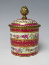 A SERVES 18TH CENTURY PORCELAIN POT AND COVER, having overall floral detail with gilt detailing,