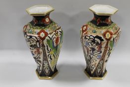 A LARGE PAIR OF NORITAKE CABINET VASES - CIRCA 1930, highly decorated in various colours, printed