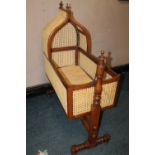 AN ANTIQUE BERGERE ROCKING CRADLE, H 123 cm, L 102 cm