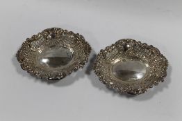 A PAIR OF HALLMARKED SILVER PIERCED BON BON DISHES BY ROBERTS & DORE LTD - LONDON 1969, approx