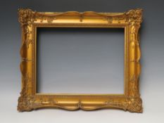 A 19TH CENTURY GOLD SWEPT FRAME, frame W 6.5 cm, rebate 28.5 x 38 cm