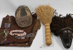 AN EAST AFRICAN MASAI LEATHER BEADED APRON, together with three items of South African Zulu beadwork