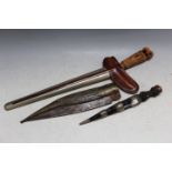 THREE ASSORTED DAGGERS, to include a Kris style example, L 48 cm